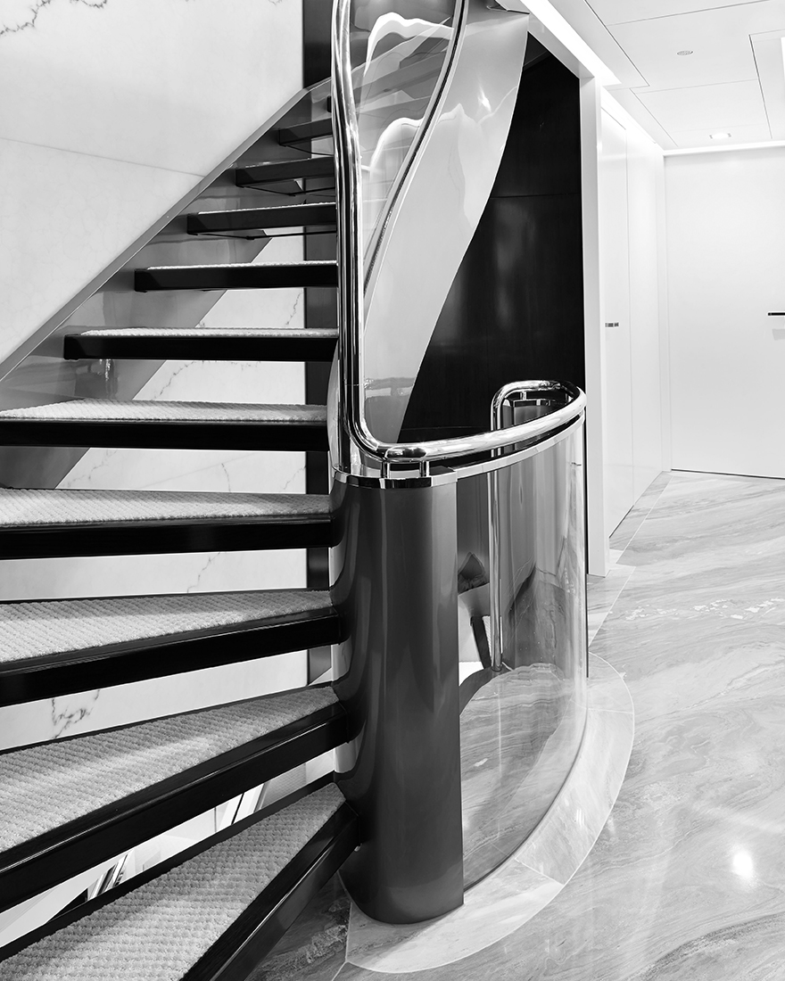 Vripack - yacht design - Ocean's Seven - Interior Design - Black and white detail of the stairs